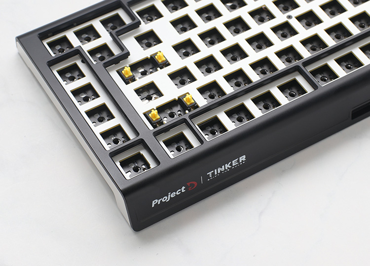 Provide a barebone edition without switches and keycaps, allowing users to customize the keyboard to their preference.
